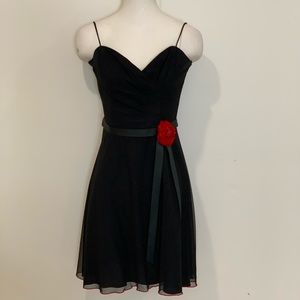 Black Cocktail dress with red flower accent